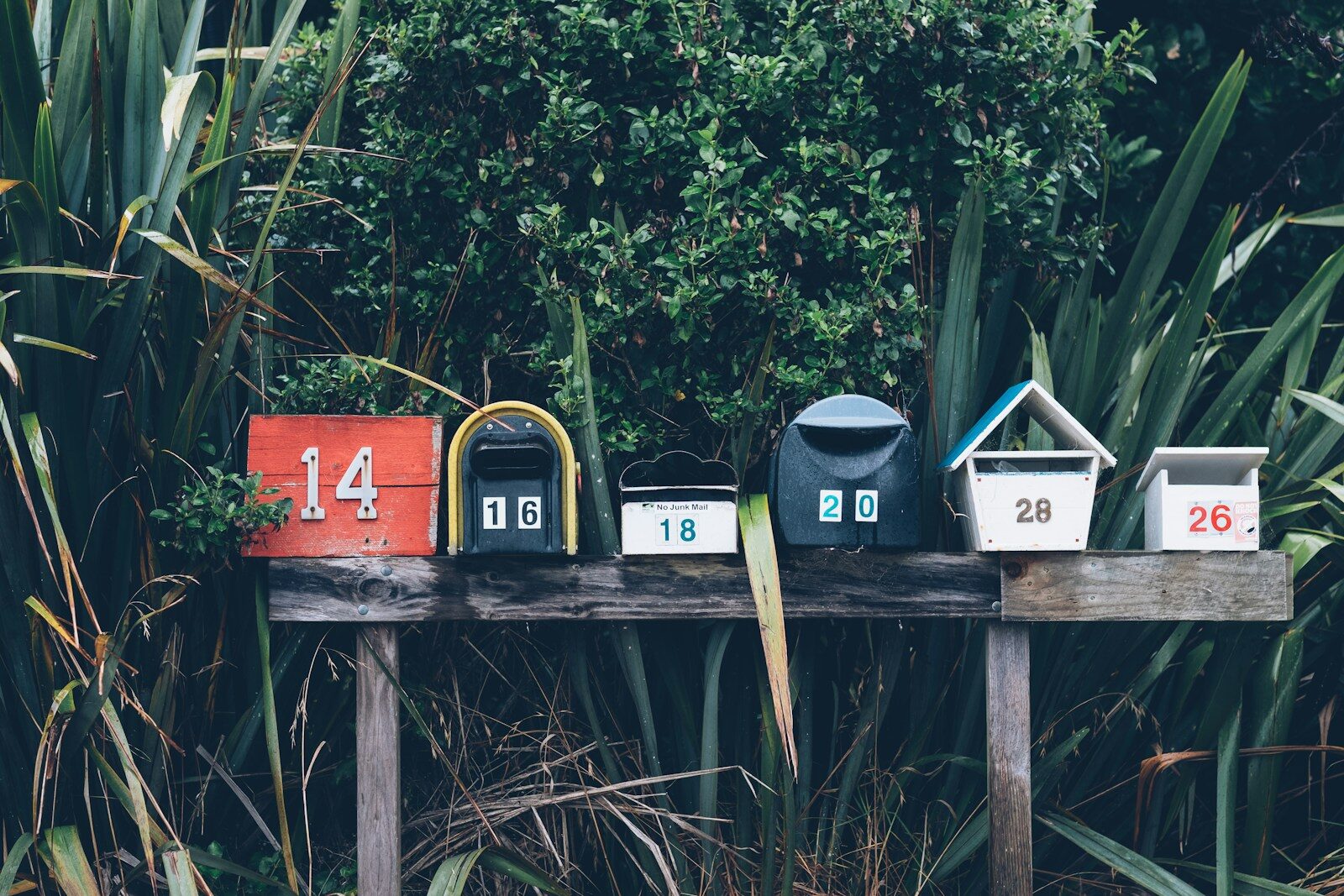 contact six assorted-color mail boxes